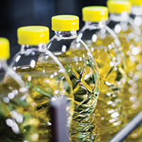 Refined vegetable oil undergoing bottling at a plant