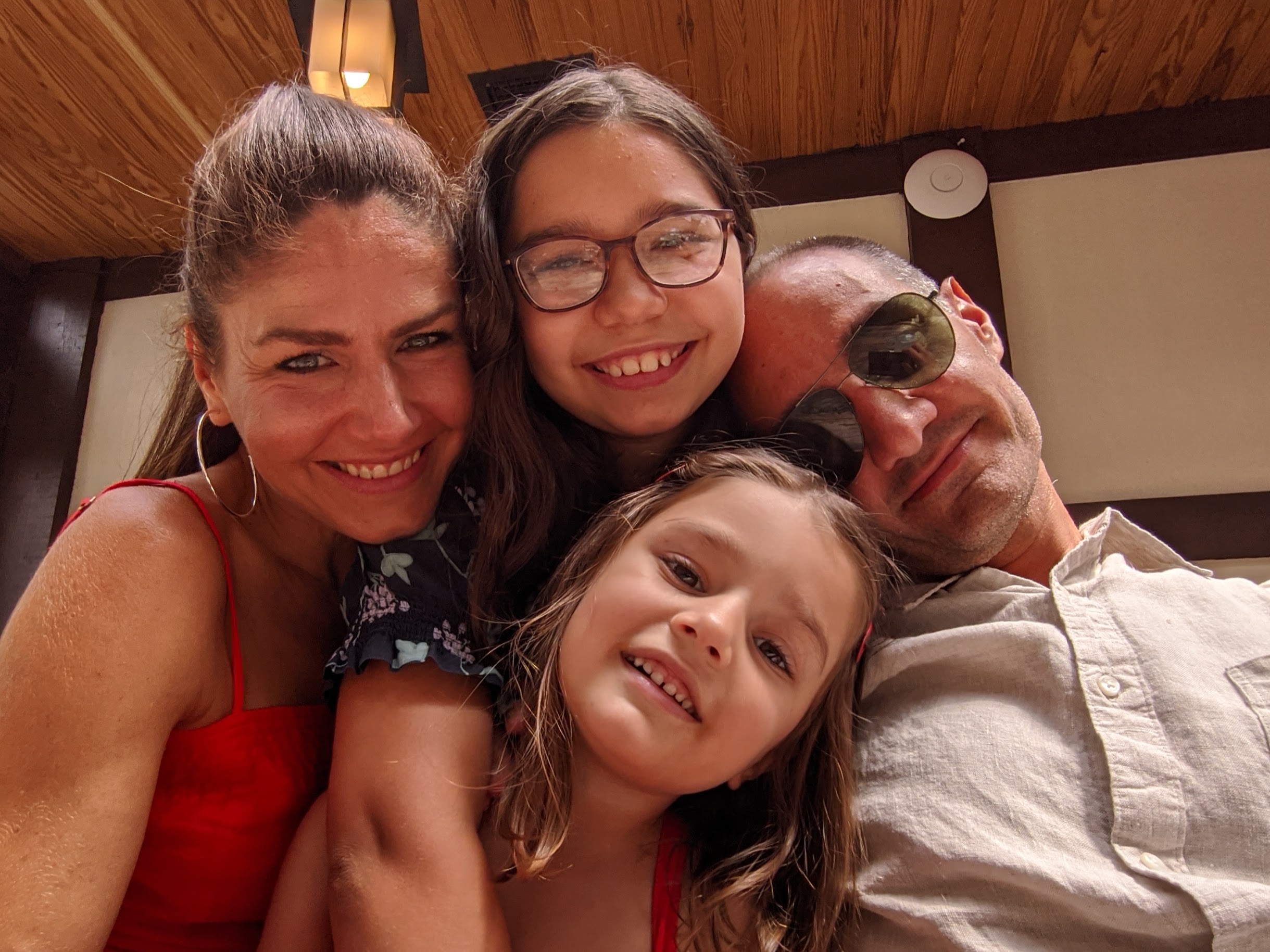 (Clockwise from the left) Sanja Natali, daughter Mia (age 10), husband Joao, and daughter Ada (age 5).